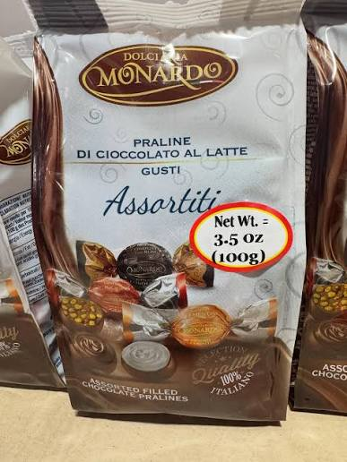 Pralines de chocolat au lait fourrées 100 g — assortiment